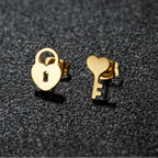 Minimalistische oorbellen sleutel en slot goud