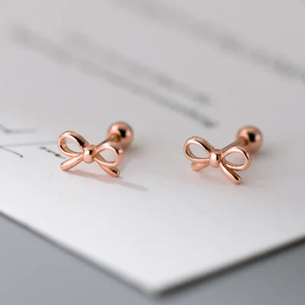 Minimalistische vlinderdasoorbellen van roségoud