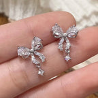 Oorbellen vlinderstrik vrouw zilver