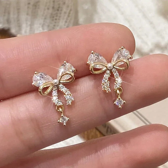 Oorbellen vlinderstrik vrouw goud