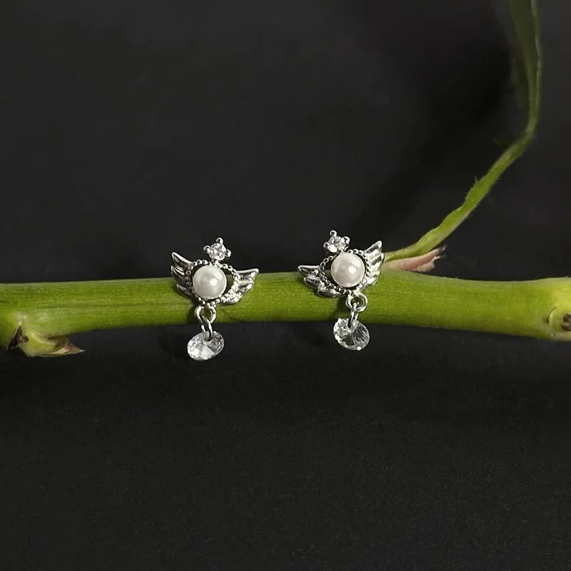 Druppelvormige oorbellen met engelenvleugels