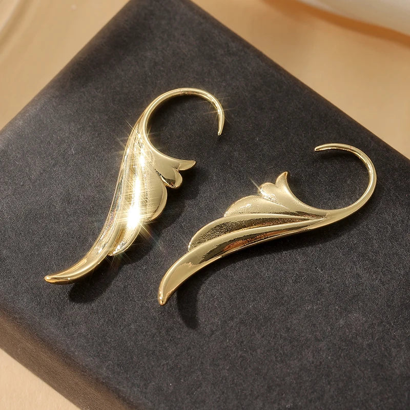 Dames oorhangers met engelenvleugels in goud