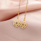 Lange hangende oorbellen met de ronde <span data-glossary-id="star-of-david">Davidster</span> joods symbool goud