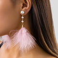 Boucles d'Oreilles Pendantes Perles et Plumes 1