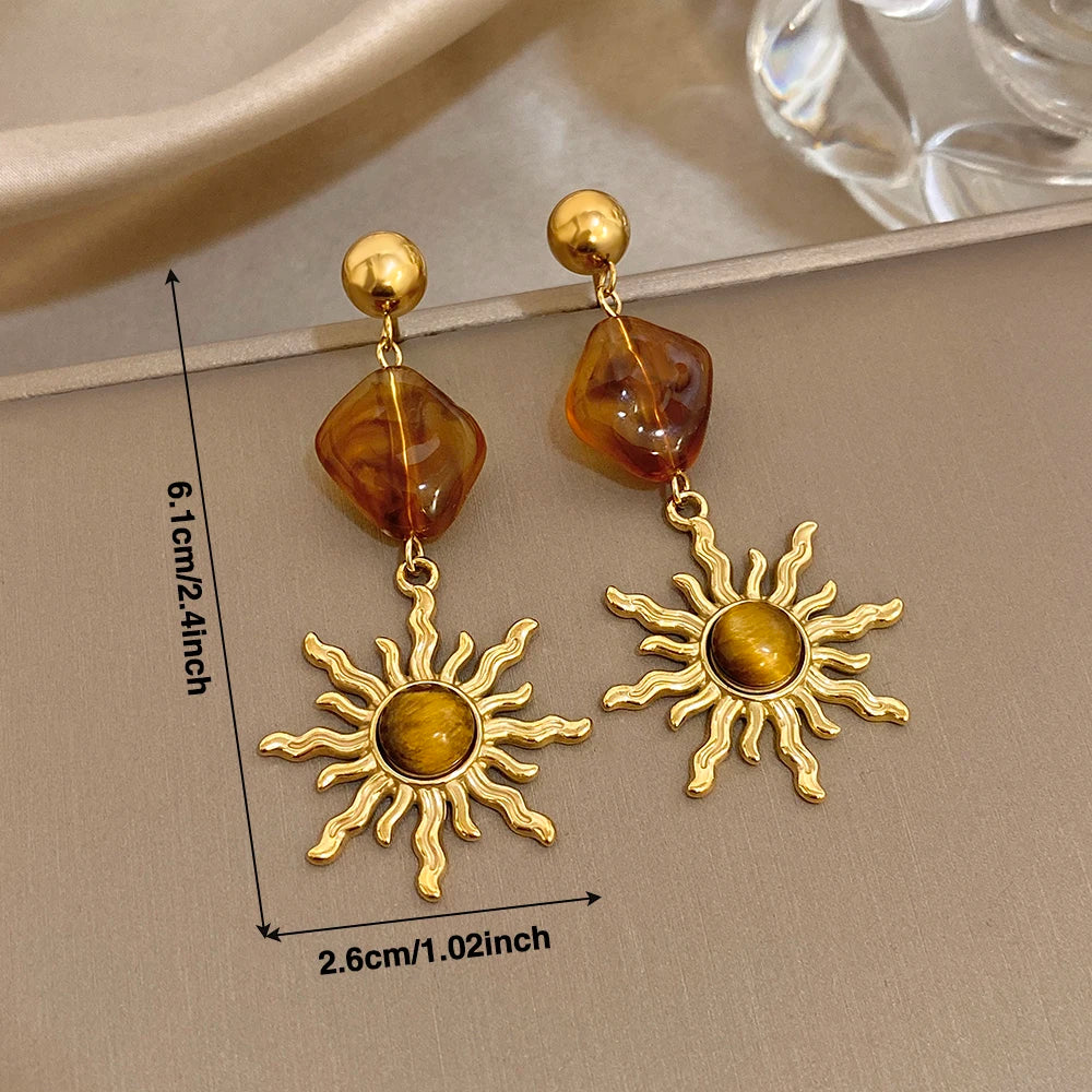 Boucles d'oreilles pendantes soleil et pierre d'oeil de tigre