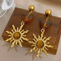 Boucles d'oreilles pendantes soleil et pierre d'oeil de tigre