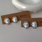 Oorbellen met geometrische parel zilver