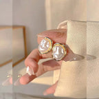 Oorbellen met geometrische parel goud
