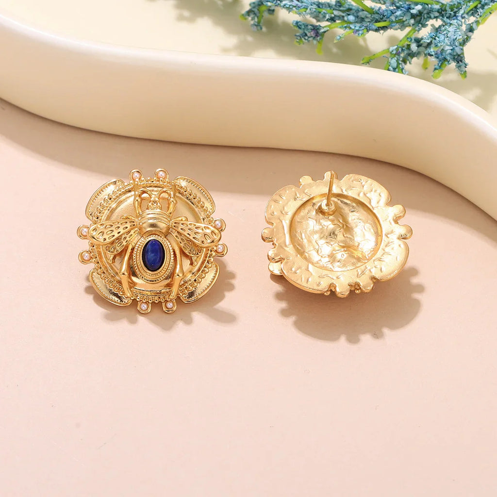 Ronde oorbellen bij goud