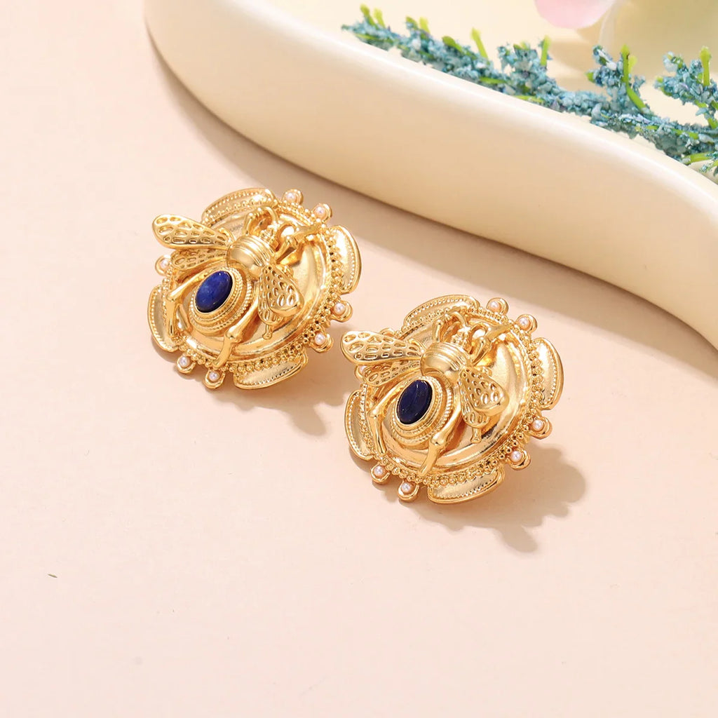 Ronde oorbellen bij goud