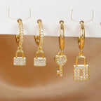 Hoepeloorbellen met sleutel en slot met strass, sleutel en slot, goud