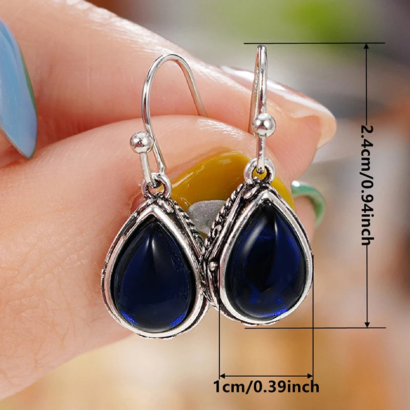 Etnische oorbellen met hun druppelvorm