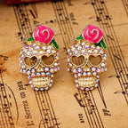 Gül ve kalp gözlü taşlı Calavera kafatası küpeleri