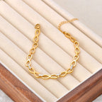 Armband met ineengestrengelde oneindigheidssymbolen goud