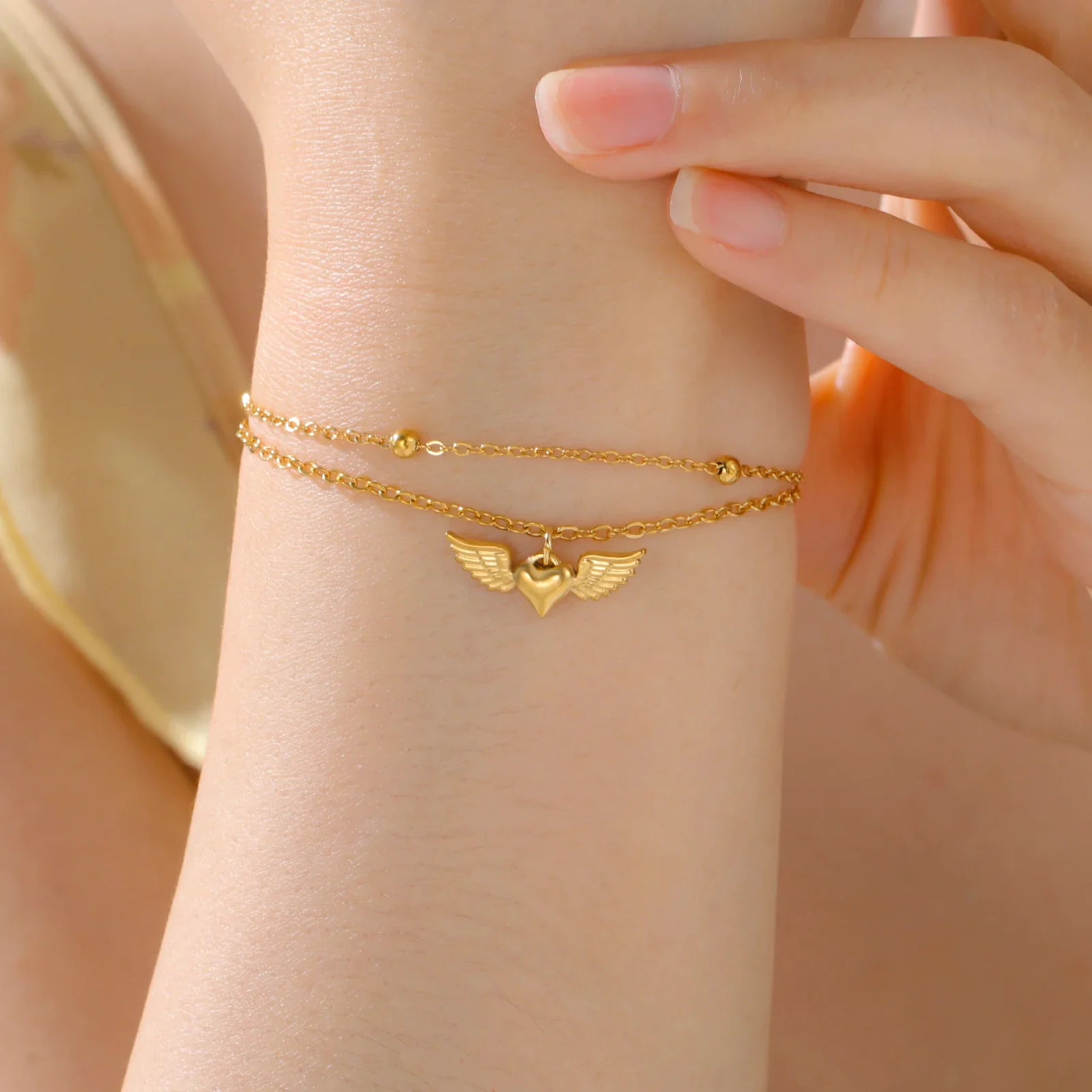 Verstelbare armband met engelenvleugels goud