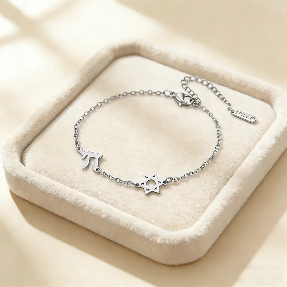Verstelbare armband met de <span data-glossary-id="etoile-de-david">Davidster</span> en <span data-glossary-id="chai">Chai</span> symbolen van Joodse verbondenheid zilver