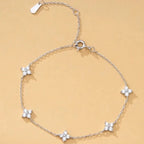 Verstelbare armband met klavertjes in strass 