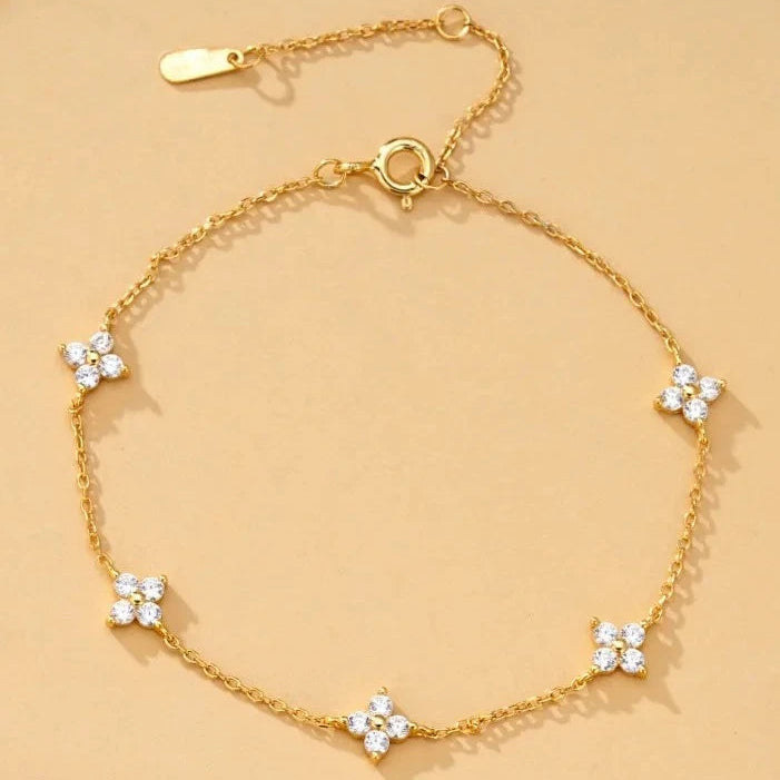 Verstelbare armband met klavertjes in strass 
