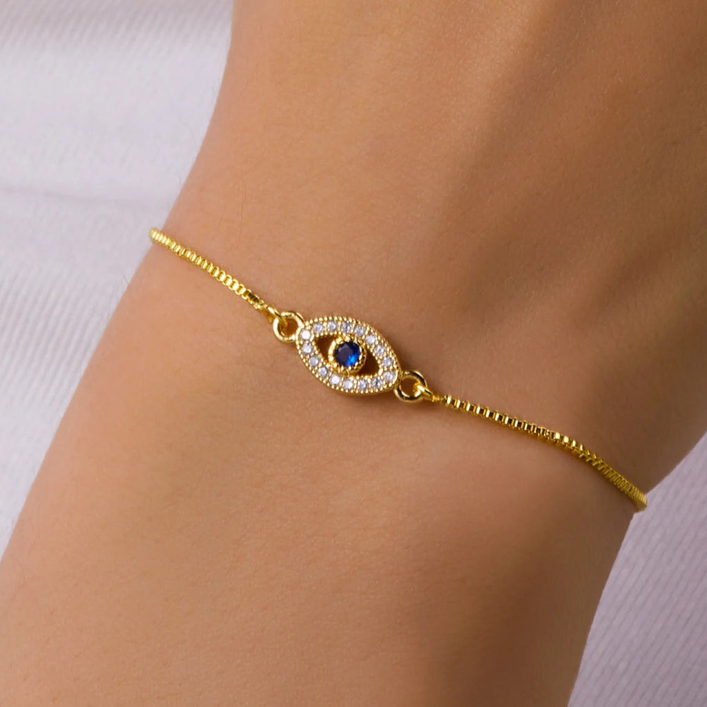 Verstelbare armband met blauw oog versierd met strass
