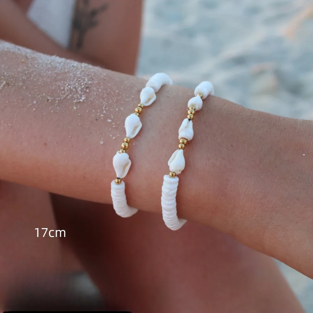 Armband met Cauri schelp en parels