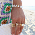 Armband met Cauri schelp en parels