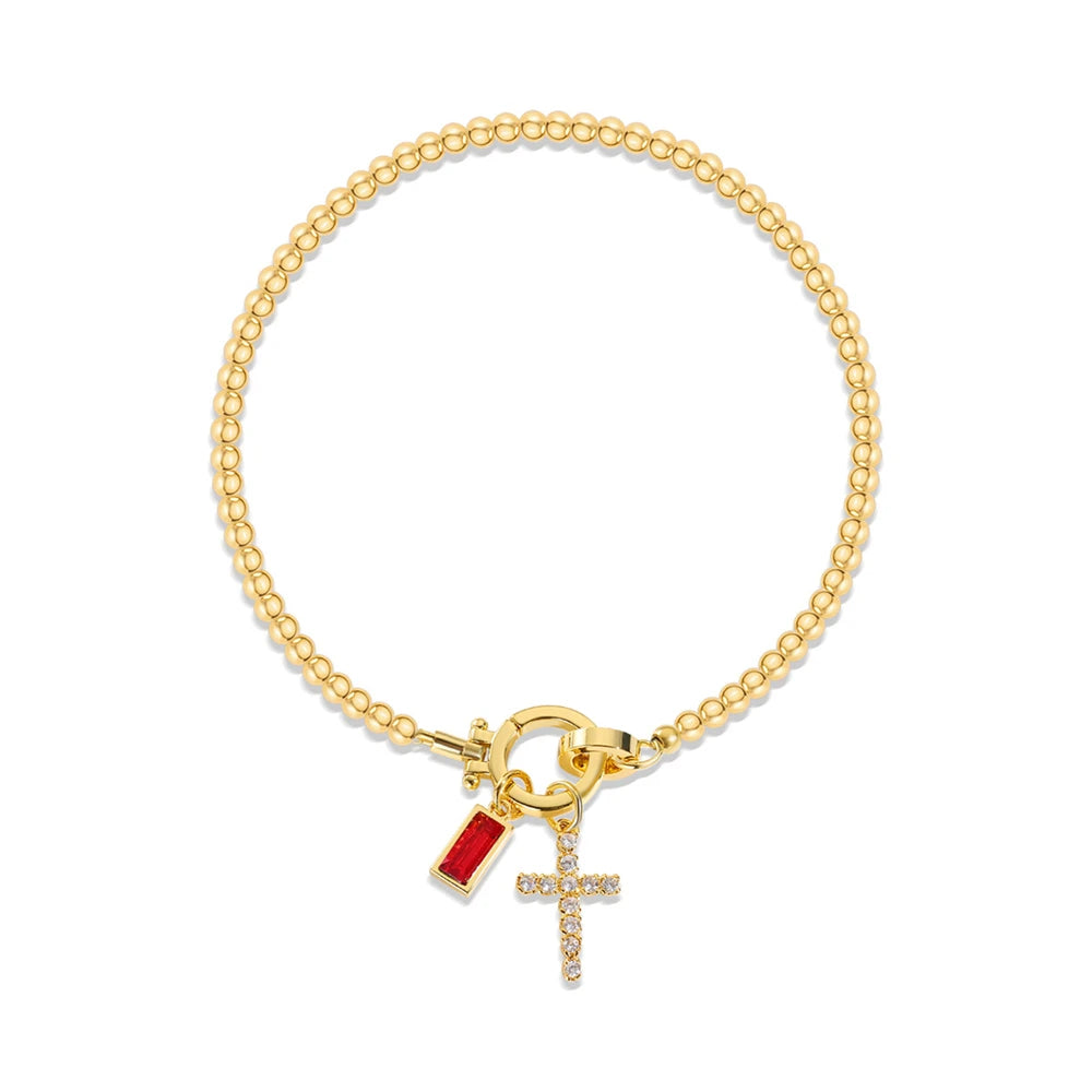 Armband met kruis en geboortesteen