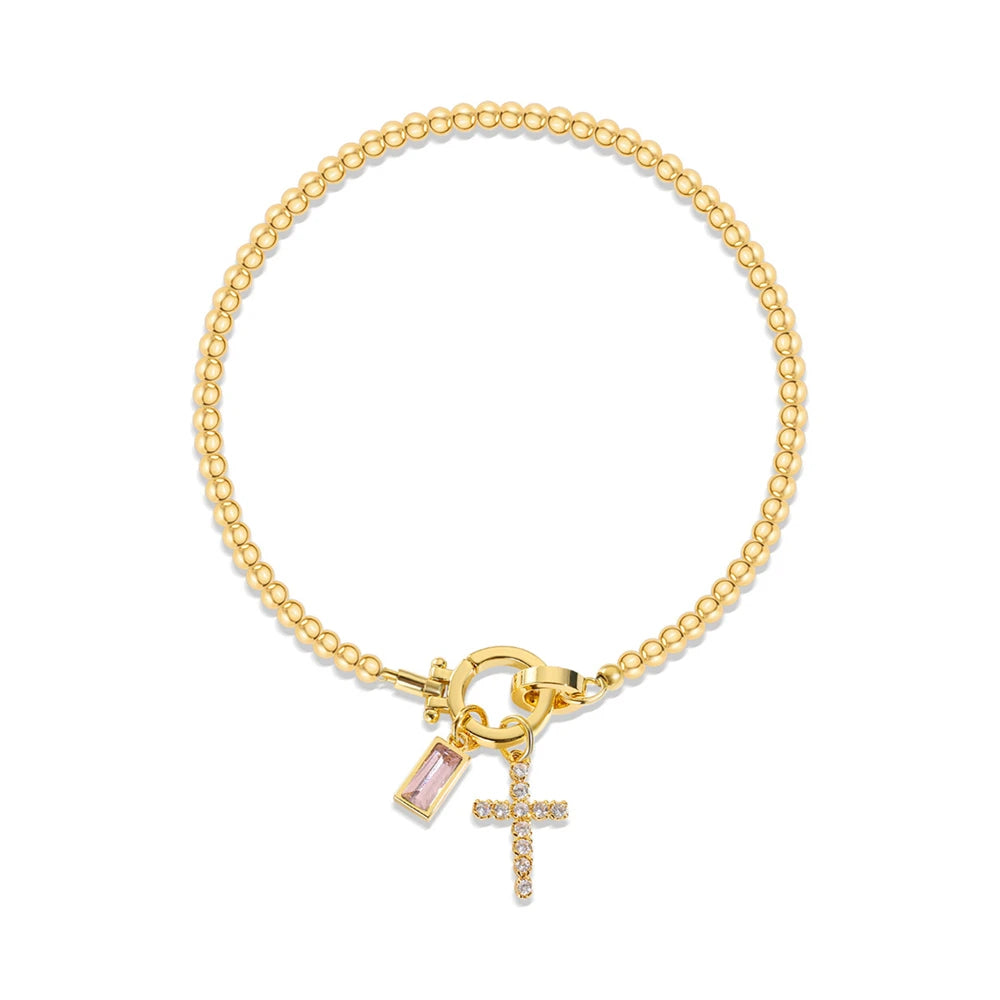 Armband met kruis en geboortesteen