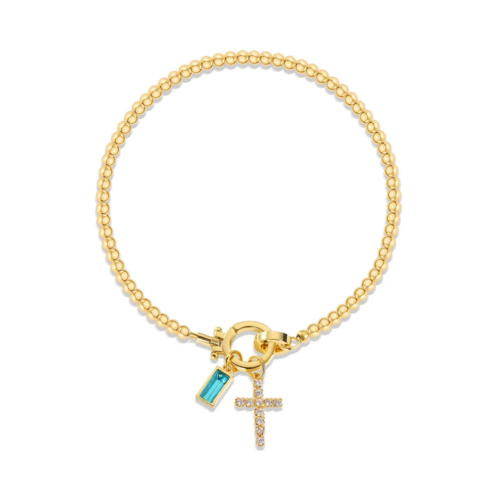 Armband met kruis en geboortesteen