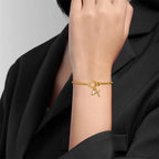 Armband met kruis en geboortesteen