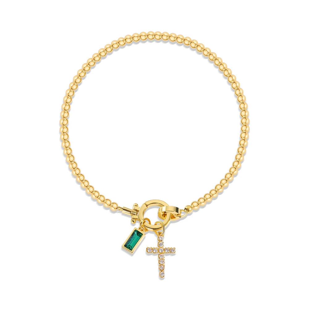 Armband met kruis en geboortesteen