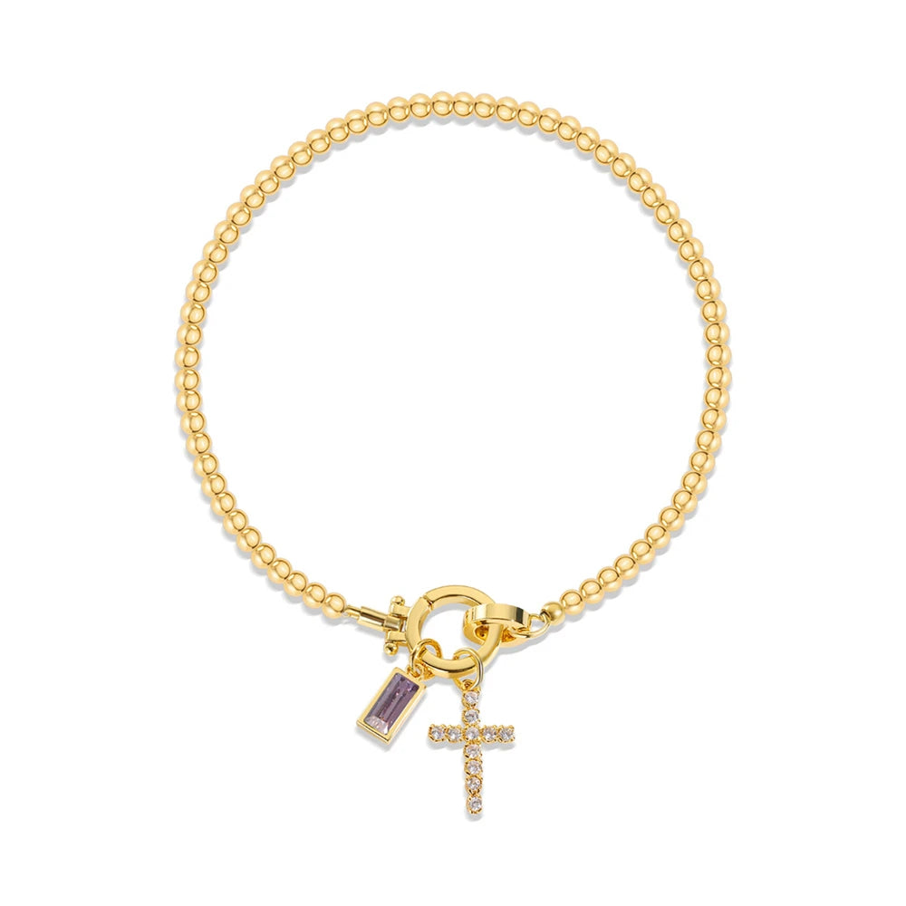 Armband met kruis en geboortesteen