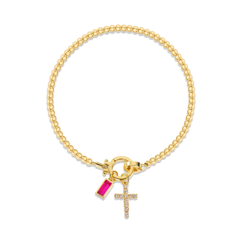 Armband met kruis en geboortesteen