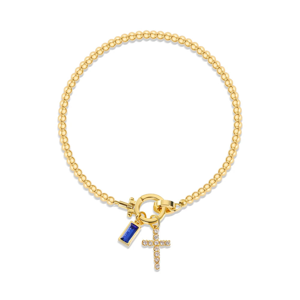 Armband met kruis en geboortesteen