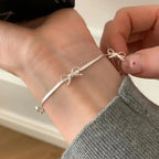 Armband met vlinderdas voor dames zilver

