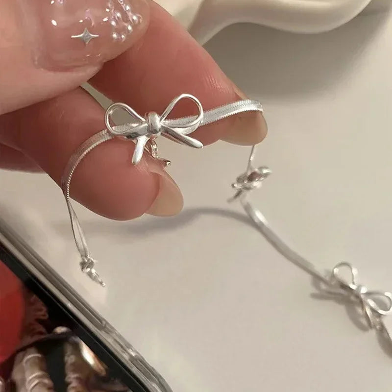 Armband met vlinderdas voor dames zilver