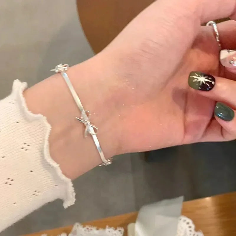 Armband met vlinderdas voor dames zilver