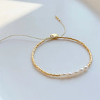 Armband met uitgelijnde zoetwaterparels
