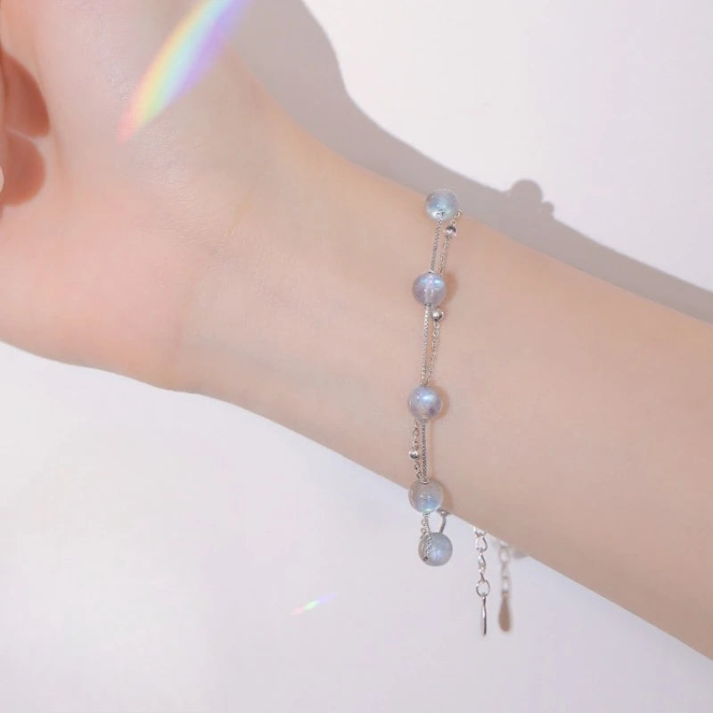 Armband met maansteen kralen met iriserende reflecties