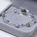 Armband met maansteen kralen met iriserende reflecties