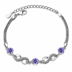 Armband met paarse kralen en oneindigheidssymbolen versierd met kristallen 