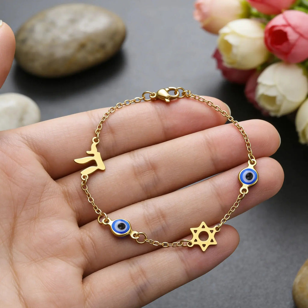 Armband met beschermsymbolen blauwe oog, Chai en de Davidster goud