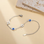 Armband met beschermsymbolen blauwe oog, Chai en de Davidster zilver