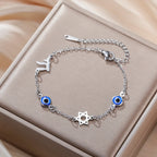 Armband met beschermsymbolen blauwe oog, Chai en de Davidster zilver