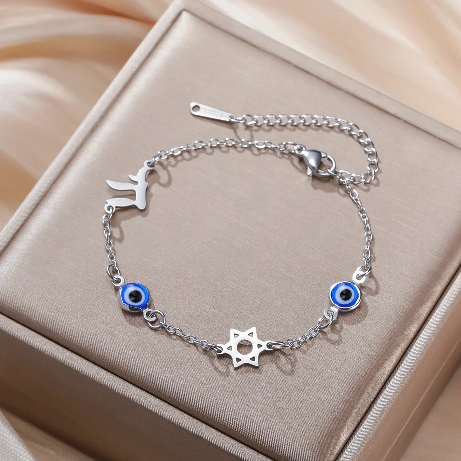 Armband met beschermsymbolen blauwe oog, Chai en de Davidster zilver