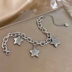 Armband met drie hangende sterren zilver