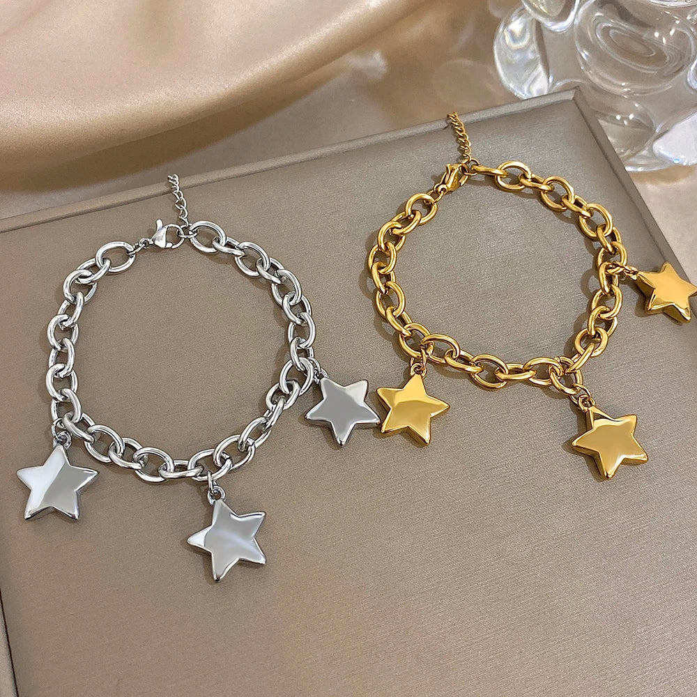 Armband met drie hangende sterren zilver