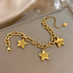 Armband met drie hangende sterren goud