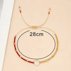 Tweetkleurige initialenarmband