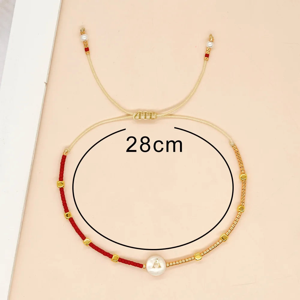 Tweetkleurige initialenarmband