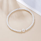 Witte initialen armband o